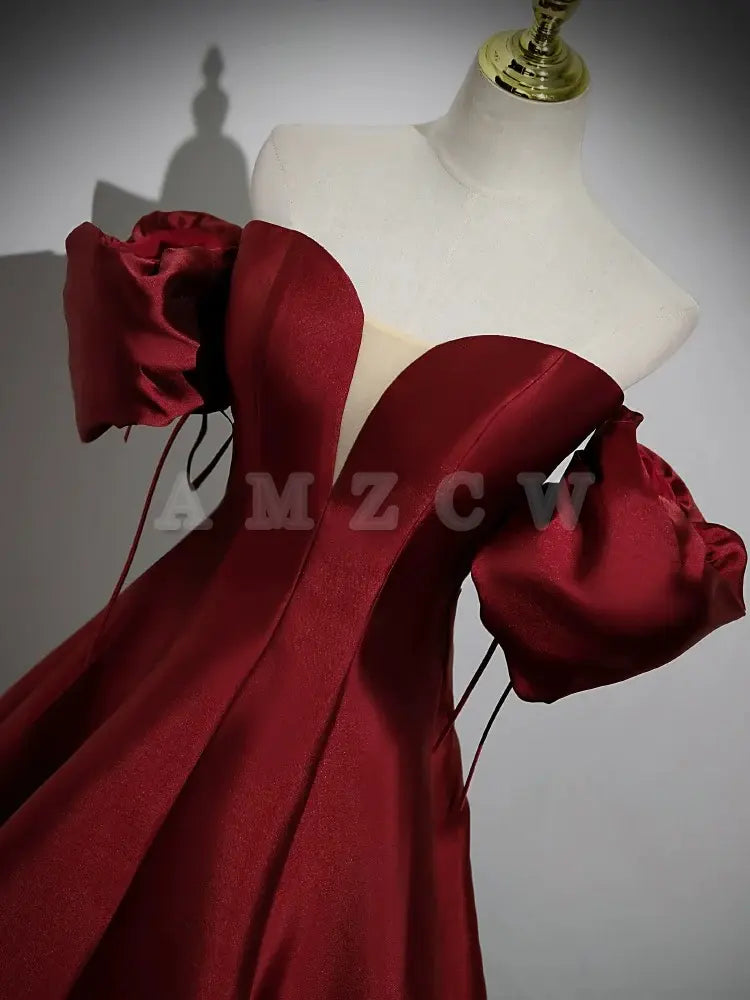 Vestido de fiesta largo burdeos de satén con mangas abullonadas y corte A de Amzcw. Vestido formal largo burdeos. Tiendas de vestidos de fiesta.