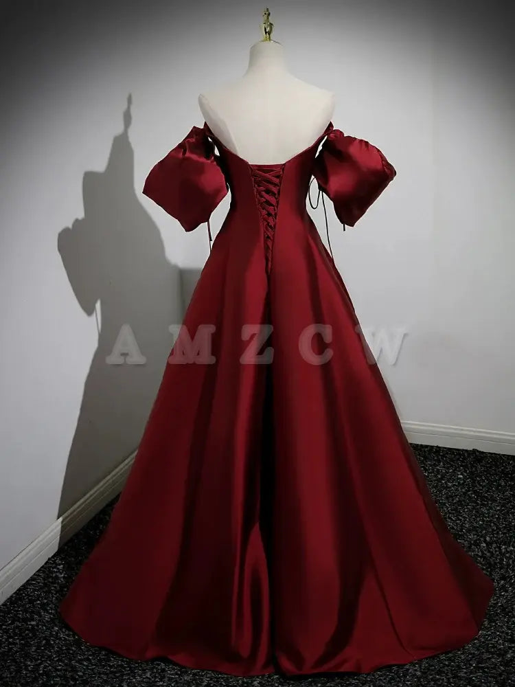 Vestido de fiesta largo burdeos de satén con mangas abullonadas y corte A de Amzcw. Vestido formal largo burdeos. Tiendas de vestidos de fiesta.