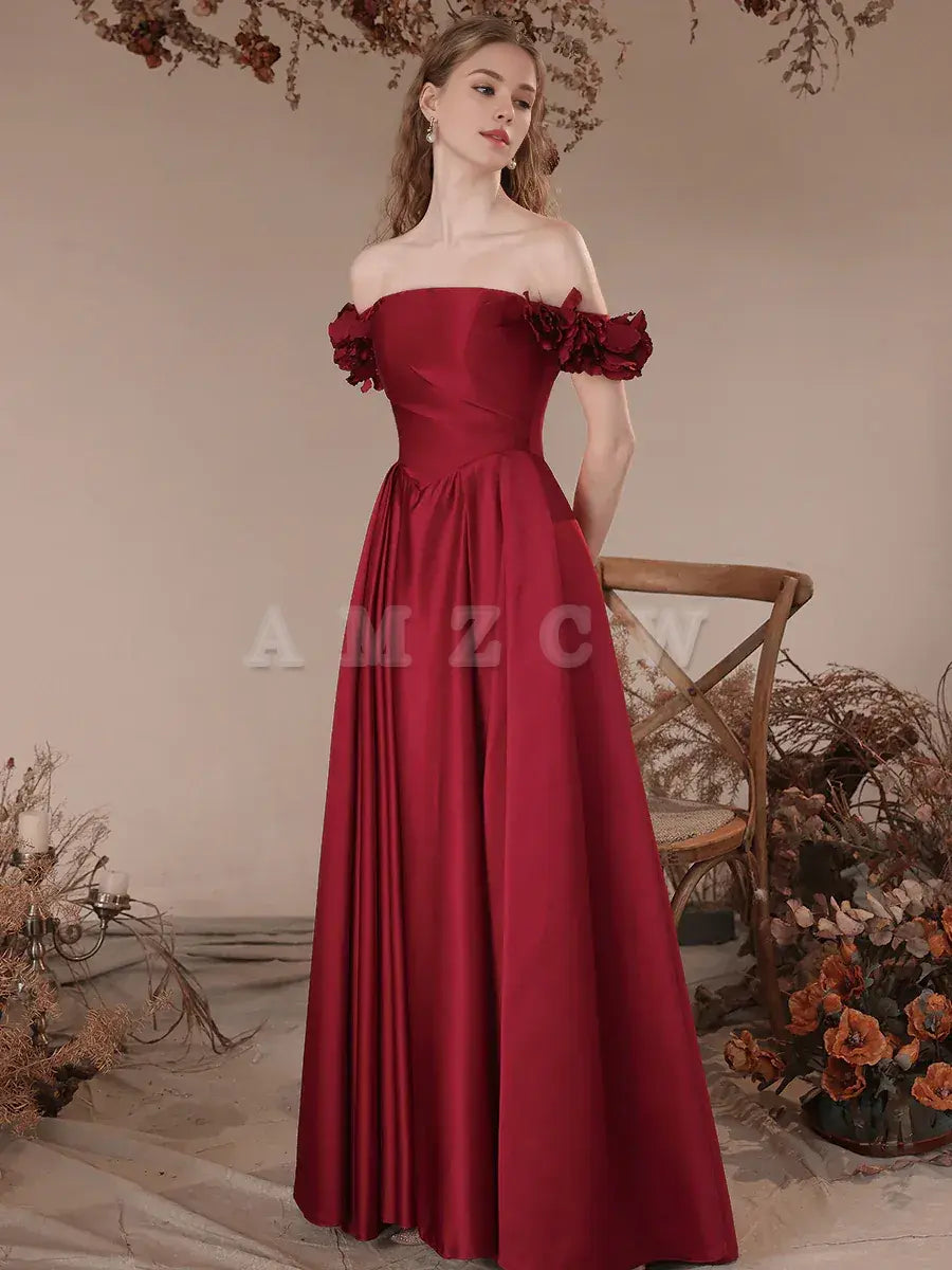 Vestido de fiesta largo de satén con hombros descubiertos y corte en A color burdeos de Amzcw. Vestido de noche formal color burdeos. Vestido de fiesta en tienda.