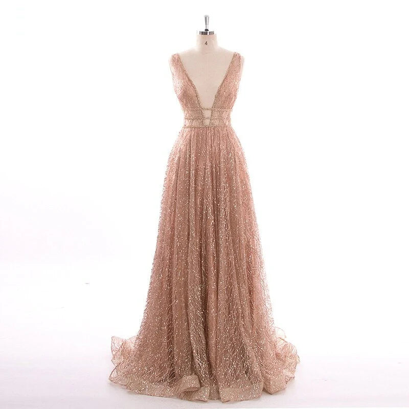 Vestido de fiesta largo estilo imperio dorado con corte en A y brillo