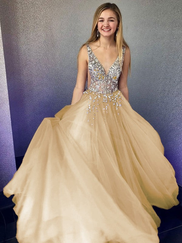 Luxurious champagne A-Line Princess floor-length dress, featuring a V-neck and sparkling beading.