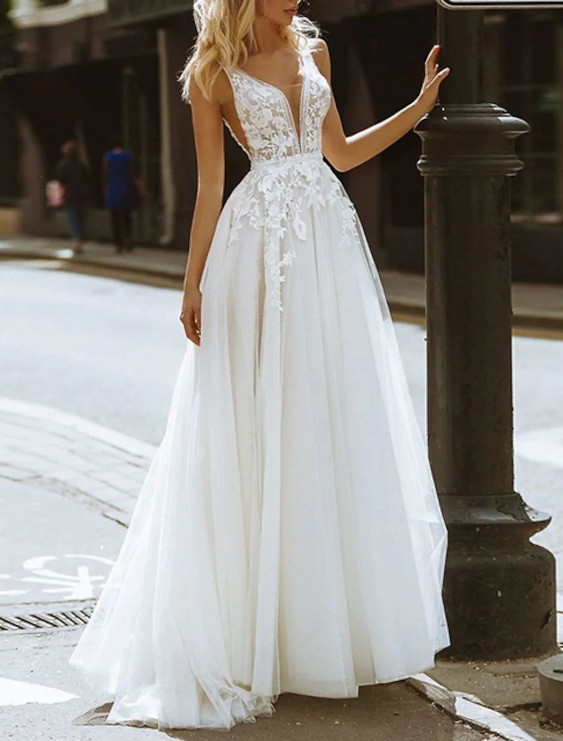 Full length view of the A-Line lace wedding dress for beach ceremonies.