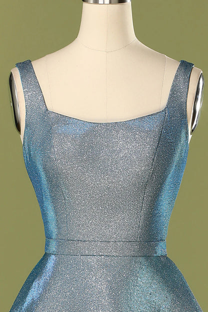 Vestido de fiesta largo con espalda abierta y brillo azul 