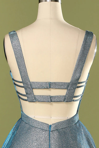 Vestido de fiesta largo con espalda abierta y brillo azul 