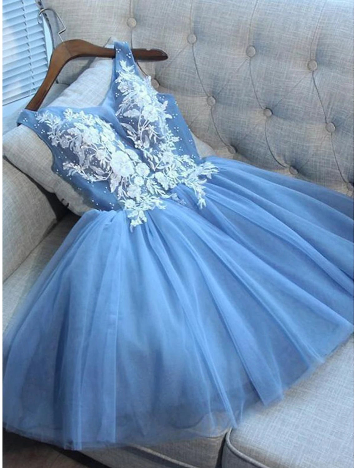 A-Line color block tulle homecoming dress with V-neck and appliques, short mini length.