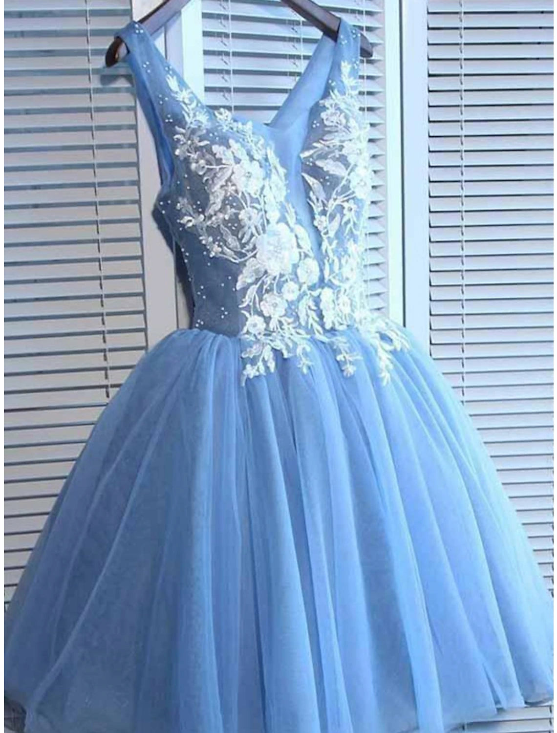 Sleeveless A-Line color block dress featuring tulle fabric, appliques, and a short mini silhouette.