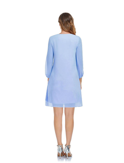Close-up of the V-neckline and 3/4 sleeves on the chiffon cocktail dress.