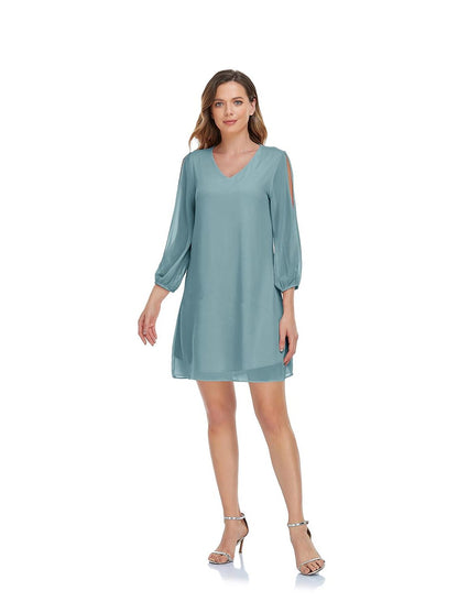 Model posing in the flowy A-Line Empire short chiffon dress, suitable for parties.