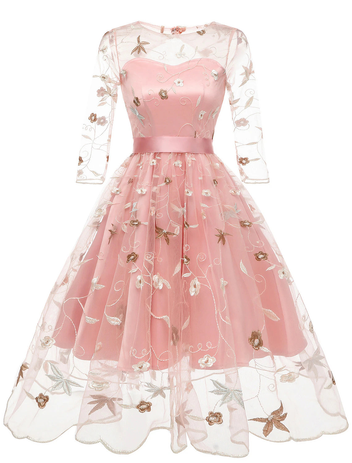 Model wearing an A-line floral tulle cocktail dress with half sleeves and jewel neck.