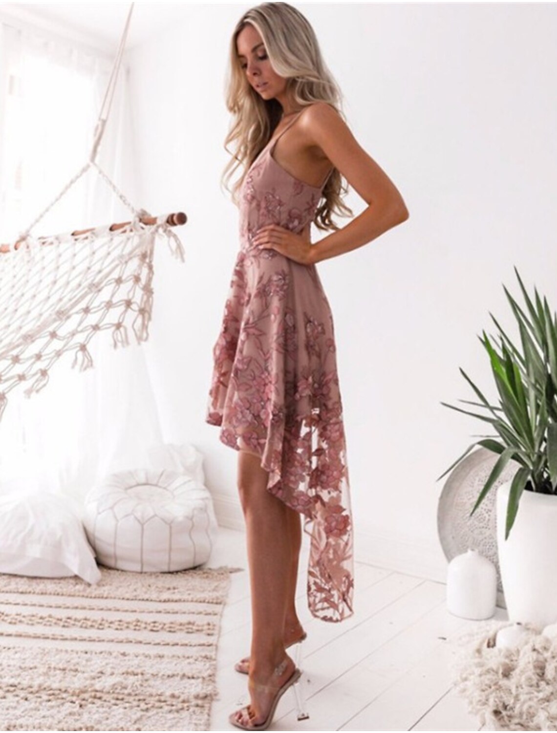 Full length view of the A-line floral dress, suitable for wedding guests.