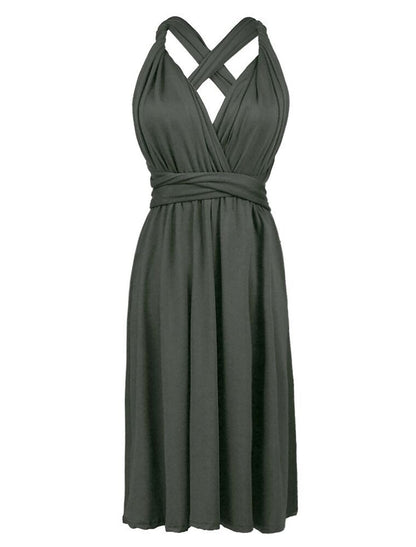 Back view of the A-line halter dress, highlighting the strappy details.