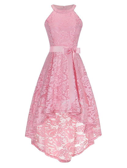 Model wearing an A-line halter lace dress with an asymmetrical hem and sash.
