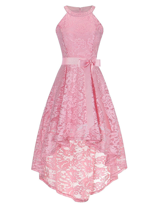 Model wearing an A-line halter lace dress with an asymmetrical hem and sash.