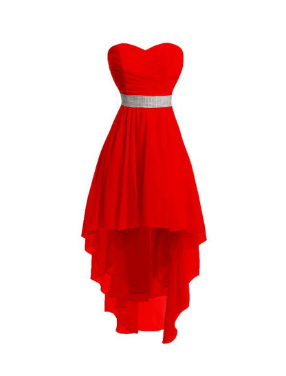 Close-up of the ruched bodice and tiered skirt of a chiffon homecoming dress.
