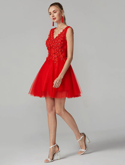 Side profile of a sleeveless V-neck dress, highlighting the A-line silhouette and crystal embellishments.