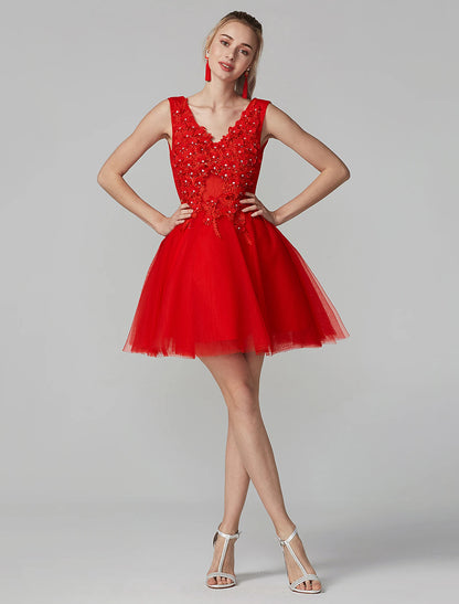 Close-up of the bodice of the A-line dress, featuring intricate lace and sparkling crystal appliques.