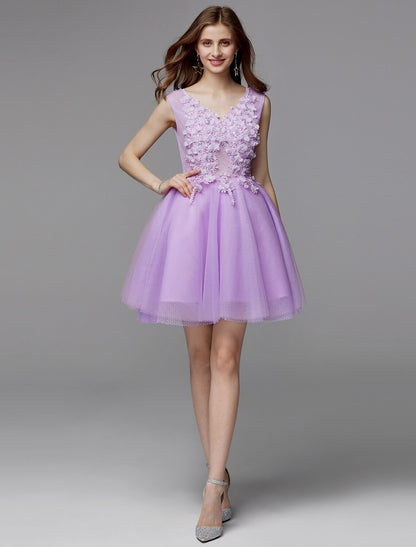 Front view of the V-neck lace dress, with the model's hands on her hips.