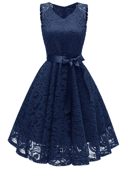 Model wearing a short V-neck A-line dress for homecoming.