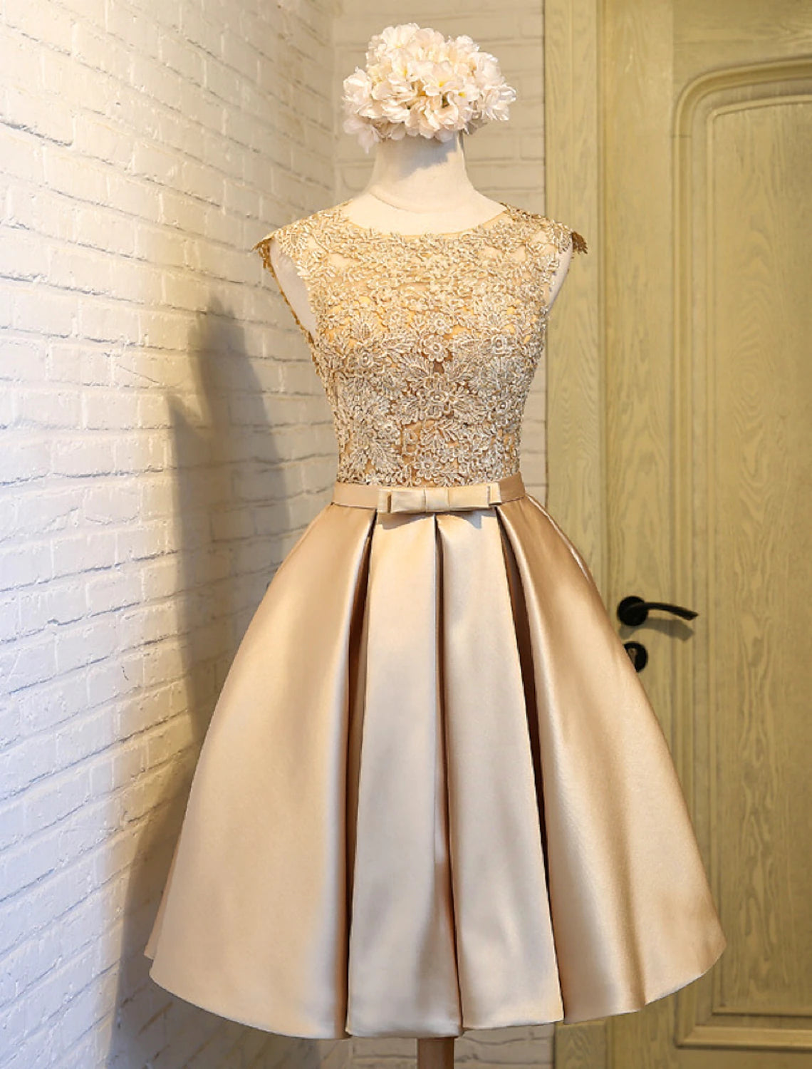 Another angle of the A-line lace dress, showing its flow and knee-length hem.