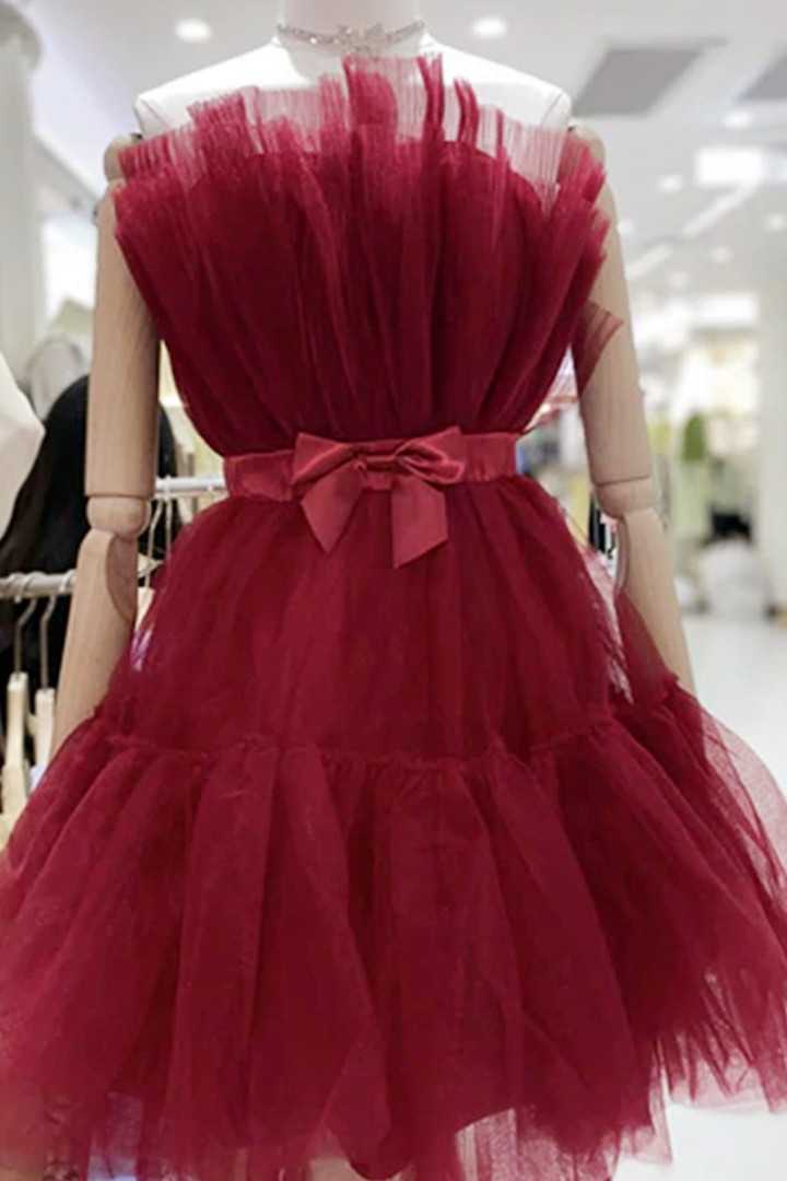 Vestido de cóctel de tul rosa por encima de la rodilla con lazo y corte en A 