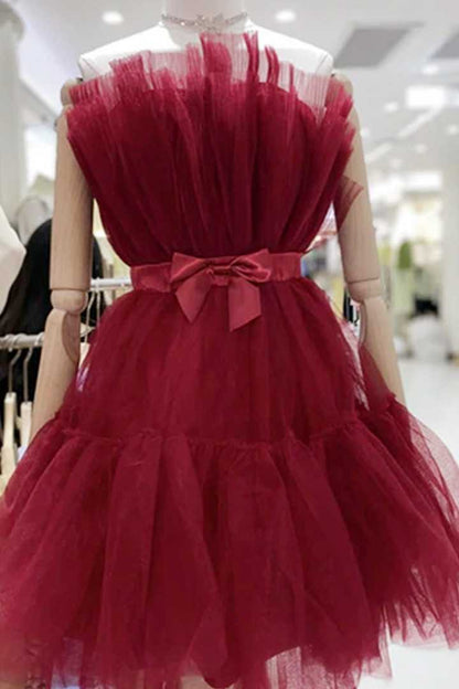 Vestido de cóctel de tul rosa por encima de la rodilla con lazo y corte en A 