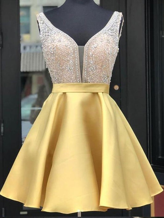 Model wearing an A-Line satin short homecoming dress with V-neck and beading.