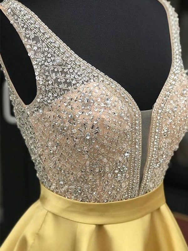 Model showcasing an A-Line satin short homecoming dress with V-neck and beading.