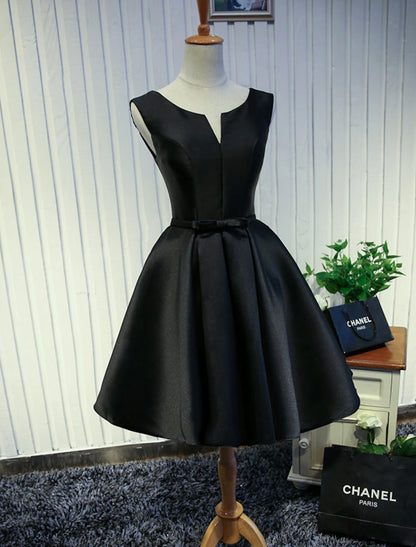 Side profile of a minimalist satin dress, knee length.