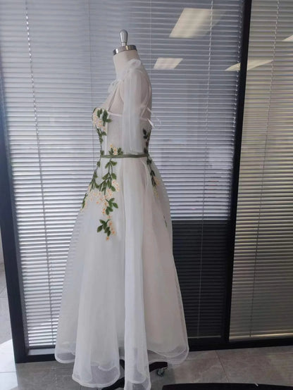 Vestido de fiesta con tirantes en la espalda, corte A, apliques y bolsillos 