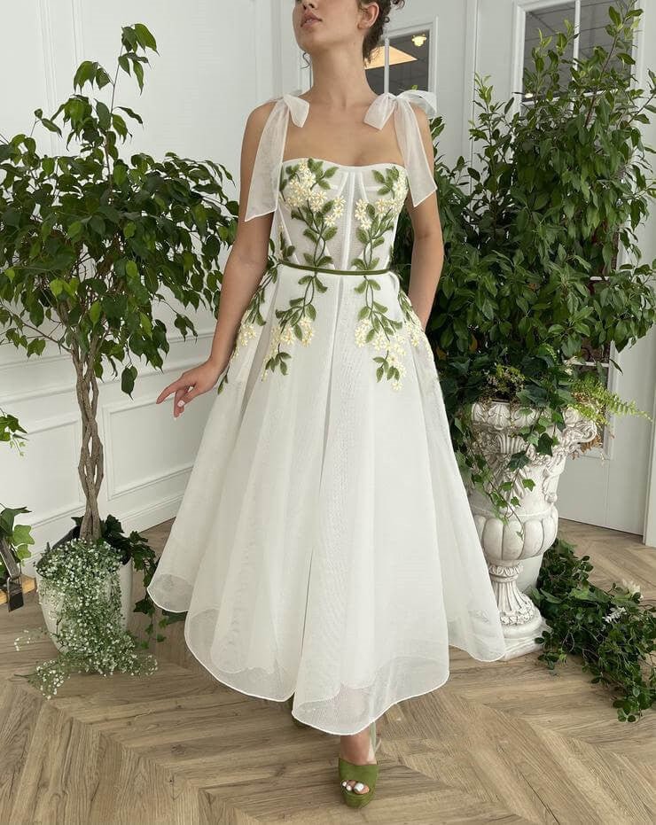 Vestido de fiesta con tirantes en la espalda, corte A, apliques y bolsillos 