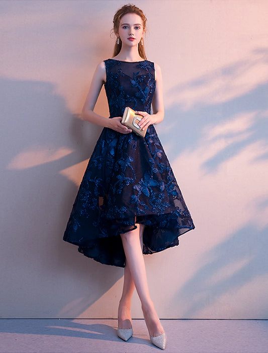Elegant A-Line tulle cocktail dress with an asymmetrical hem, jewel neck, and pleated details.