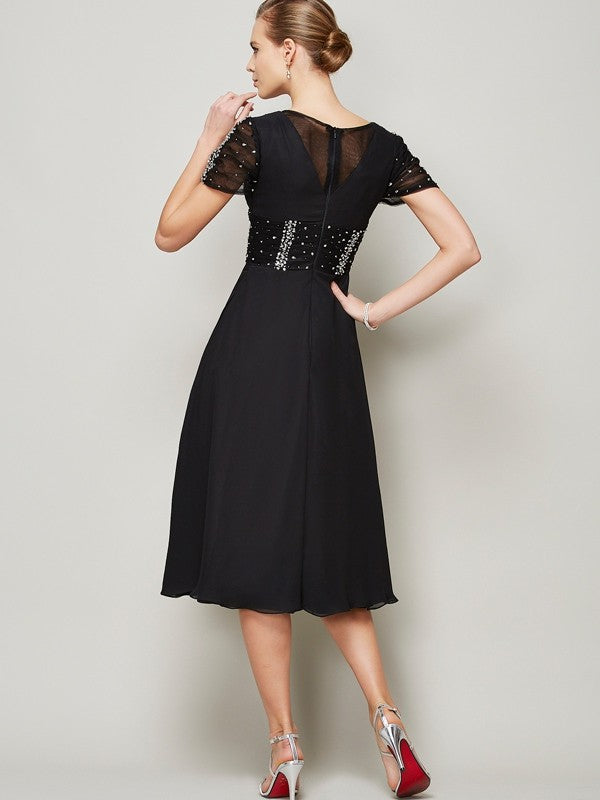 Side view of an A-Line V-neck chiffon homecoming dress with short sleeves and ruffles.