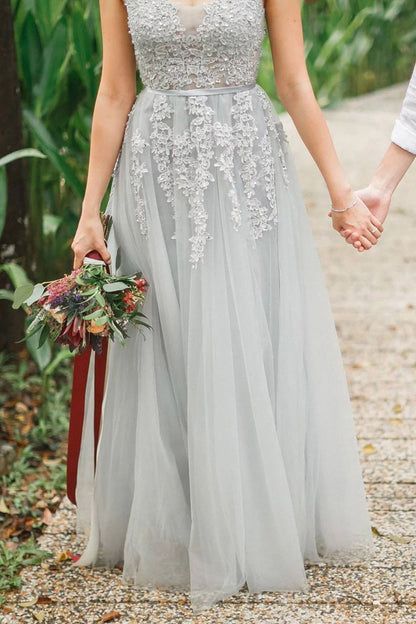 Vestido de fiesta largo sin mangas hasta el suelo con escote en V, de tul blanco con apliques de encaje 
