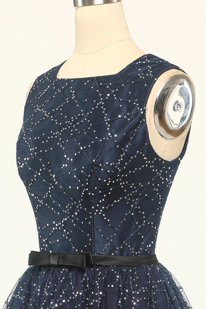 Vestido de fiesta de tul azul marino con purpurina 