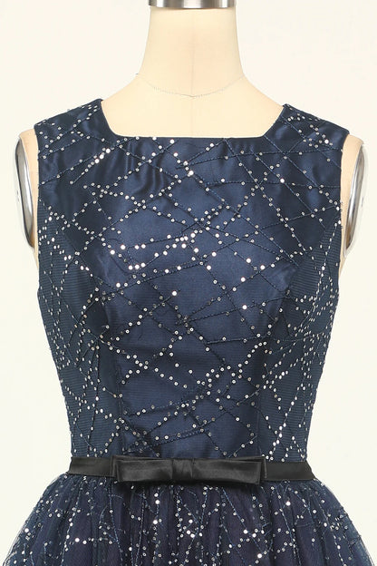 Vestido de fiesta de tul azul marino con purpurina 