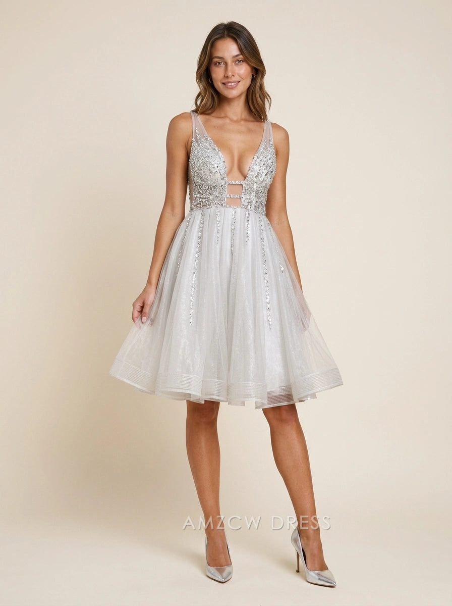 Back view of the silver A-line homecoming dress, highlighting the V-back and sequin details.