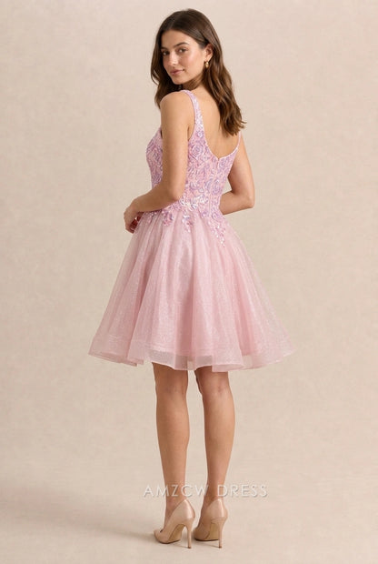 Side view of a woman in a pink sequin A-line short party dress.