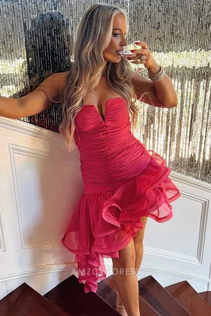 Close-up of the fuchsia dress, focusing on the sweetheart neckline and ruched detailing.