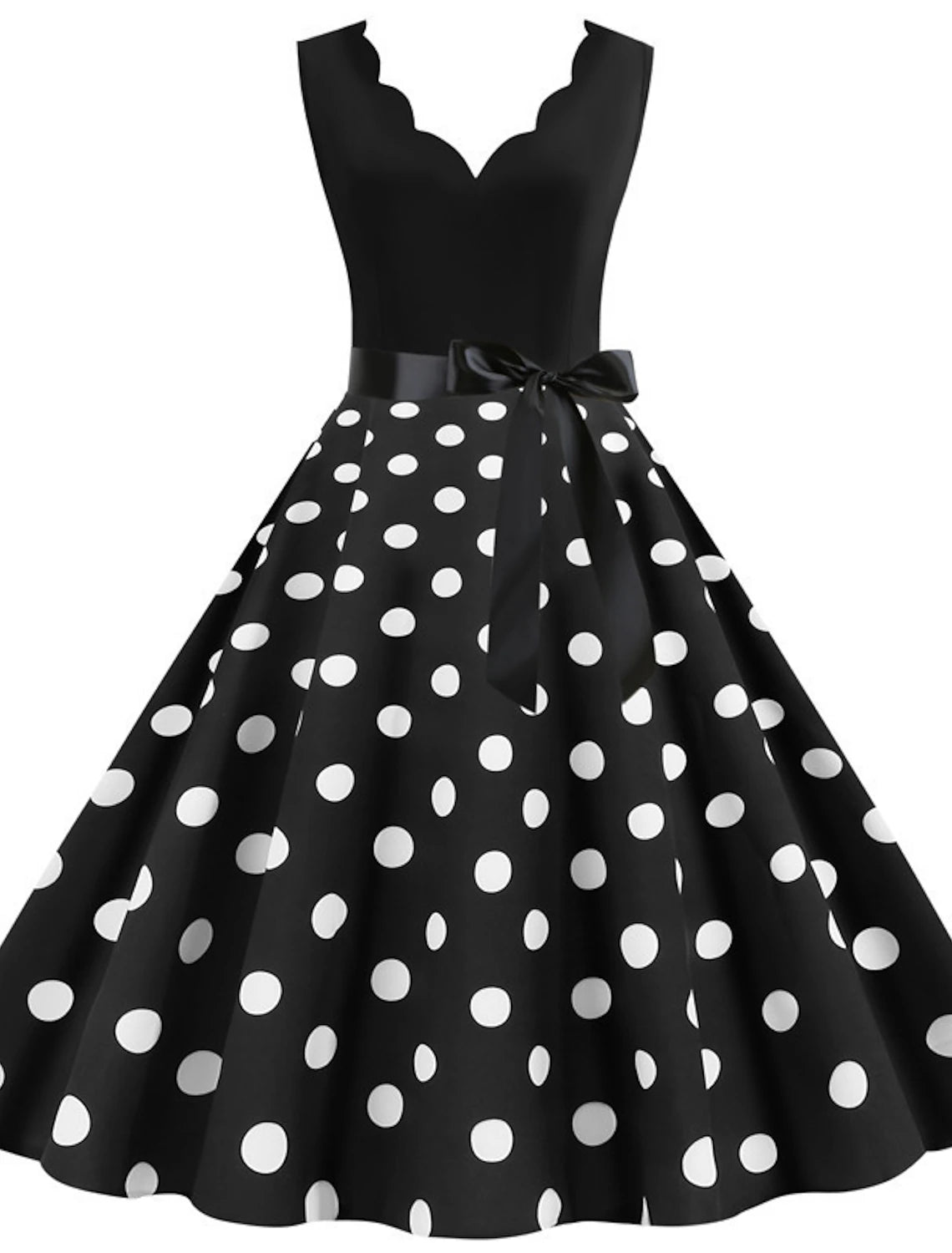 Side view of a woman in a classic polka dot rockabilly style dress.