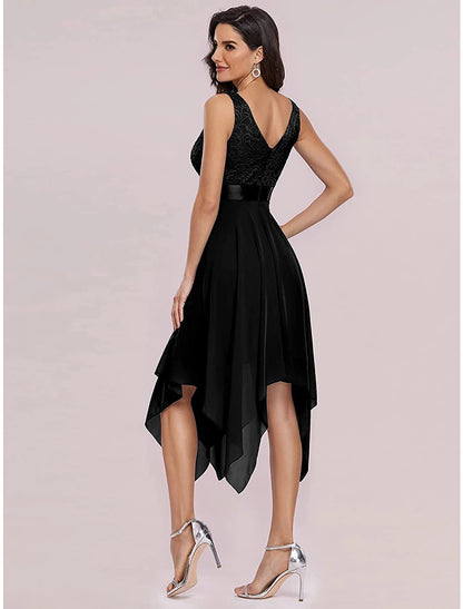 Close-up of the dark A-line chiffon dress, highlighting the V-neckline and the fabric texture.