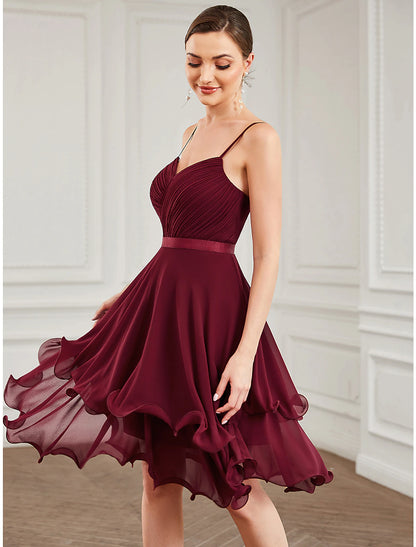 Elegant A-line short homecoming dress with sweetheart neckline and tiered chiffon skirt.