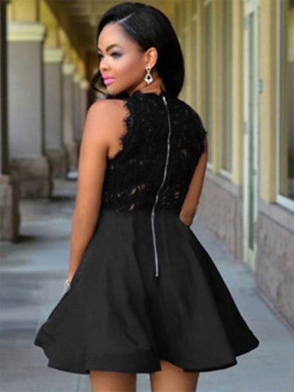 Close-up of the lace and satin fabric details on a black A-line short dress.