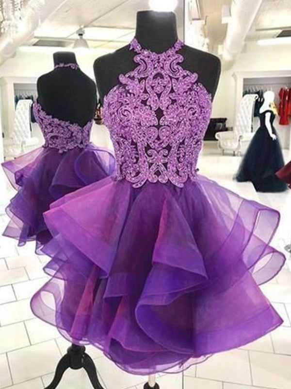 A-line organza homecoming dress with beaded halter neckline and short skirt.