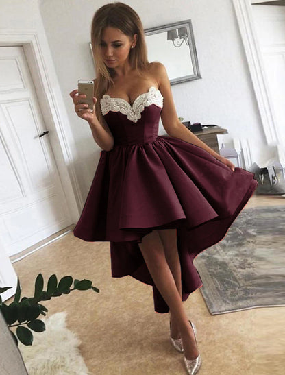 Back view of an A-Line satin dress, showing the flowing skirt.