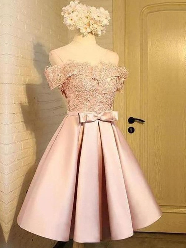 Elegant A-line satin homecoming dress with off-the-shoulder neckline and delicate appliques.