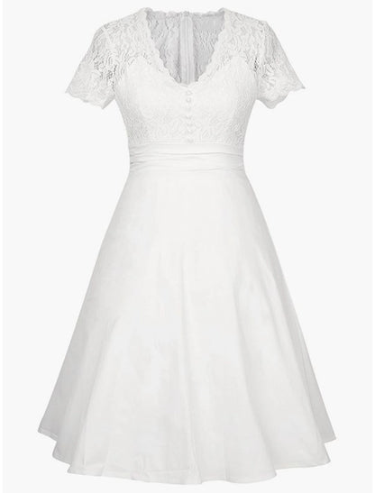 Woman wearing an elegant A-line satin party dress with appliques, V-neck, and short sleeves.