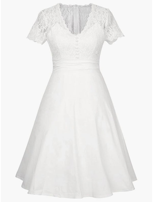 Woman wearing an elegant A-line satin party dress with appliques, V-neck, and short sleeves.