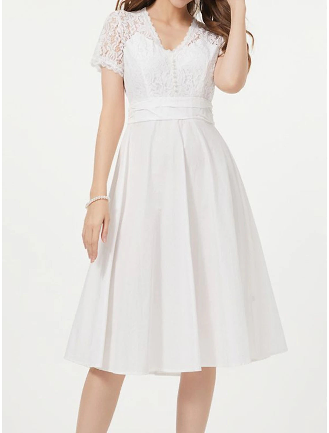 Side view of a woman in a short sleeve V-neck satin dress, suitable for homecoming.