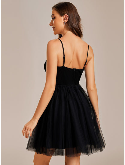 Side view of the A-line short tulle dress, highlighting the silhouette.