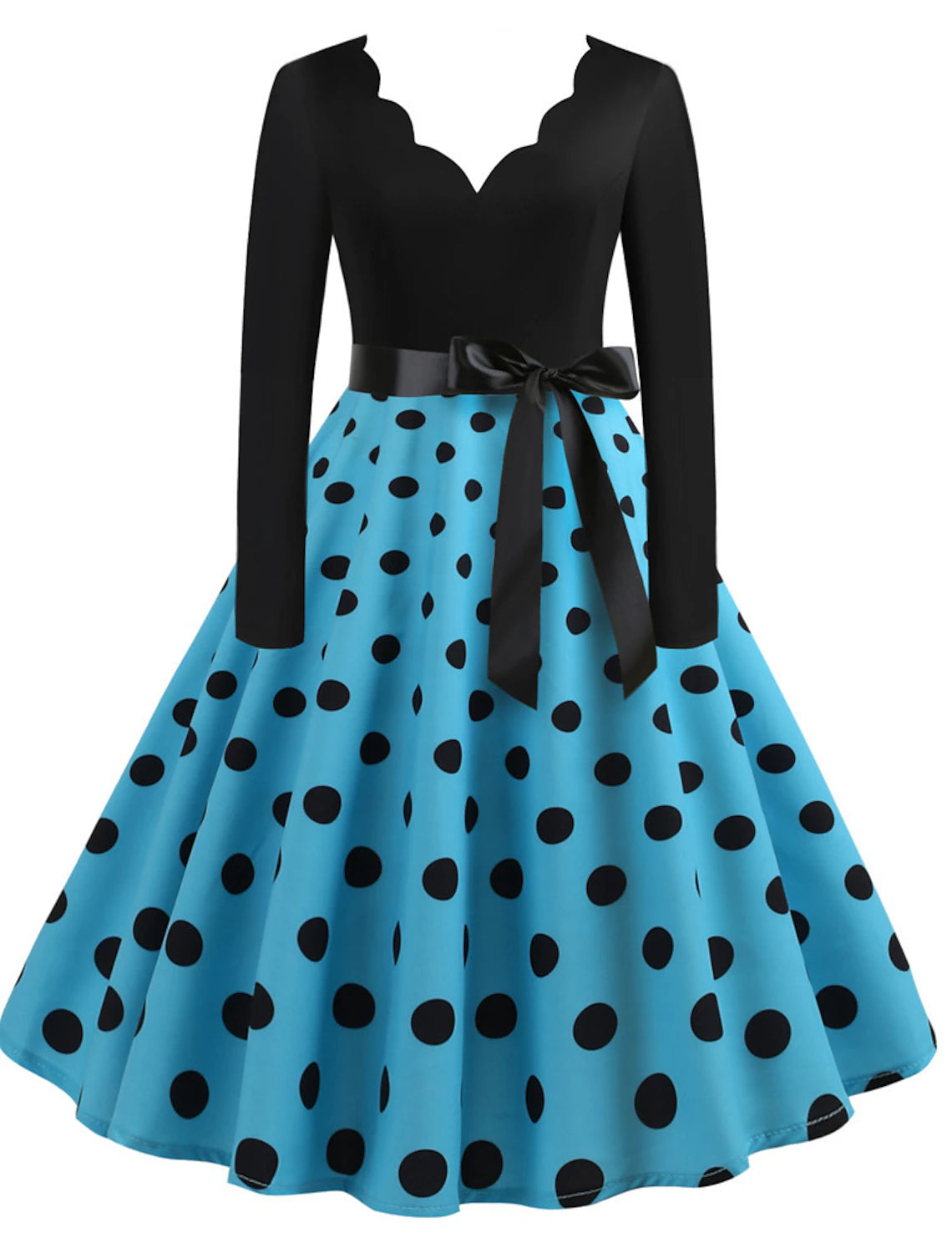 Woman wearing a purple 1950s vintage A-line midi dress with a sweetheart neckline.